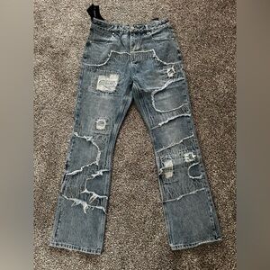 Distressed Blue Jeans